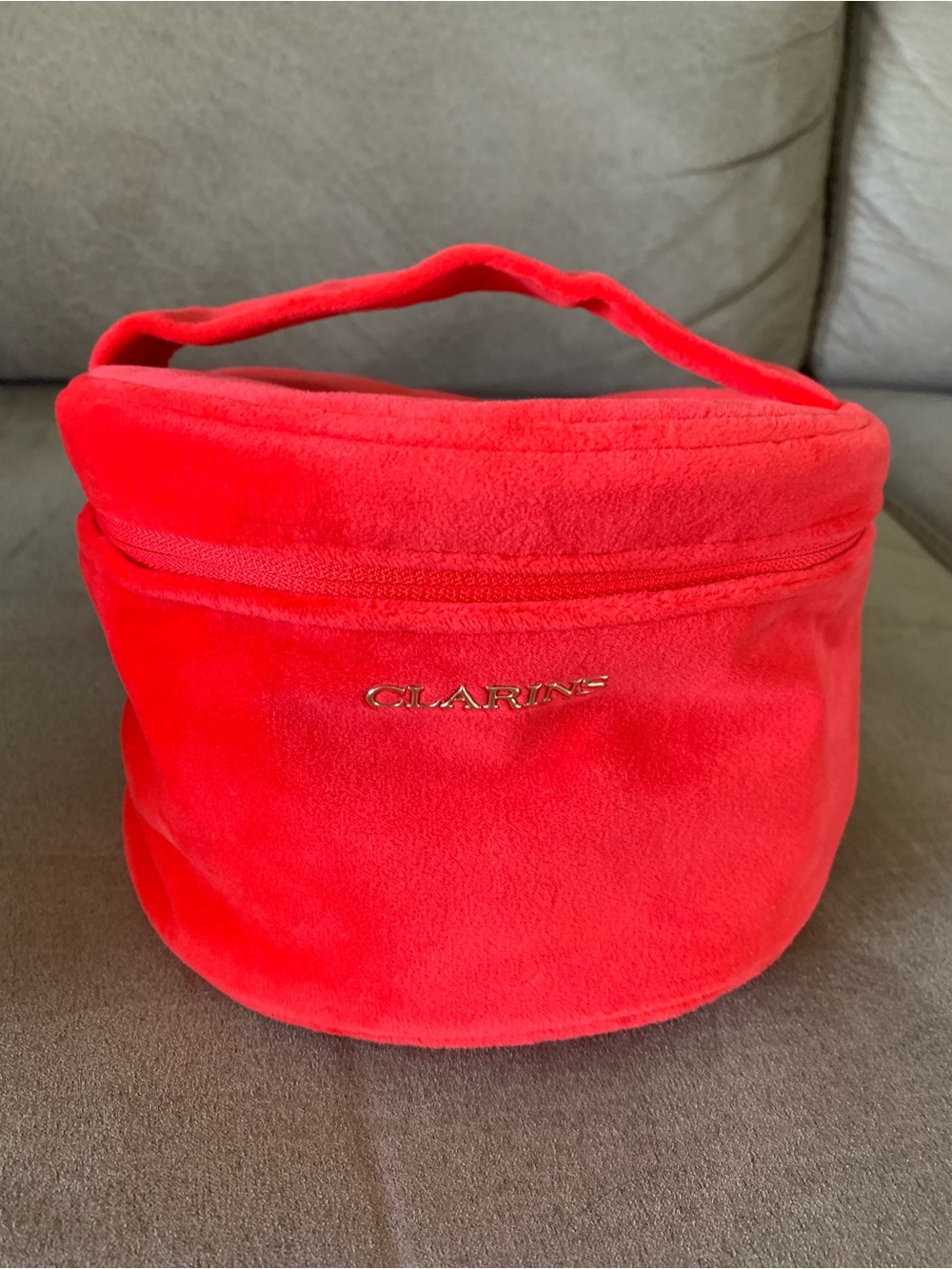 Clarins bright red velvet cosmetic case with handle